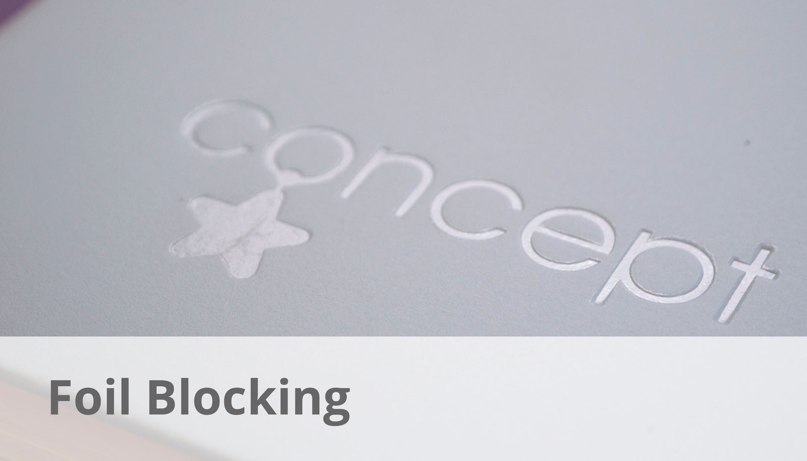 a personalised notebook which has been branded with a foil blocked company logo