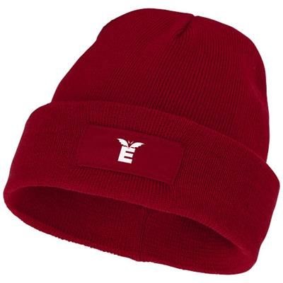 Branded Promotional BOREAS BEANIE with Patch in Red Hat From Concept Incentives.