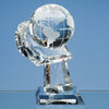 Branded Promotional 8CM OPTICAL GLASS GLOBE MOUNTED ON HAND AWARD Globe From Concept Incentives.