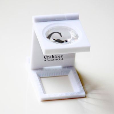 Branded Promotional PLASTIC LINEN TESTER MAGNIFIER in White Magnifier From Concept Incentives.