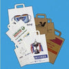 Branded Promotional SMALL TAPE HANDLE KRAFT PAPER BAG, 200X100X280MM Carrier Bag From Concept Incentives.